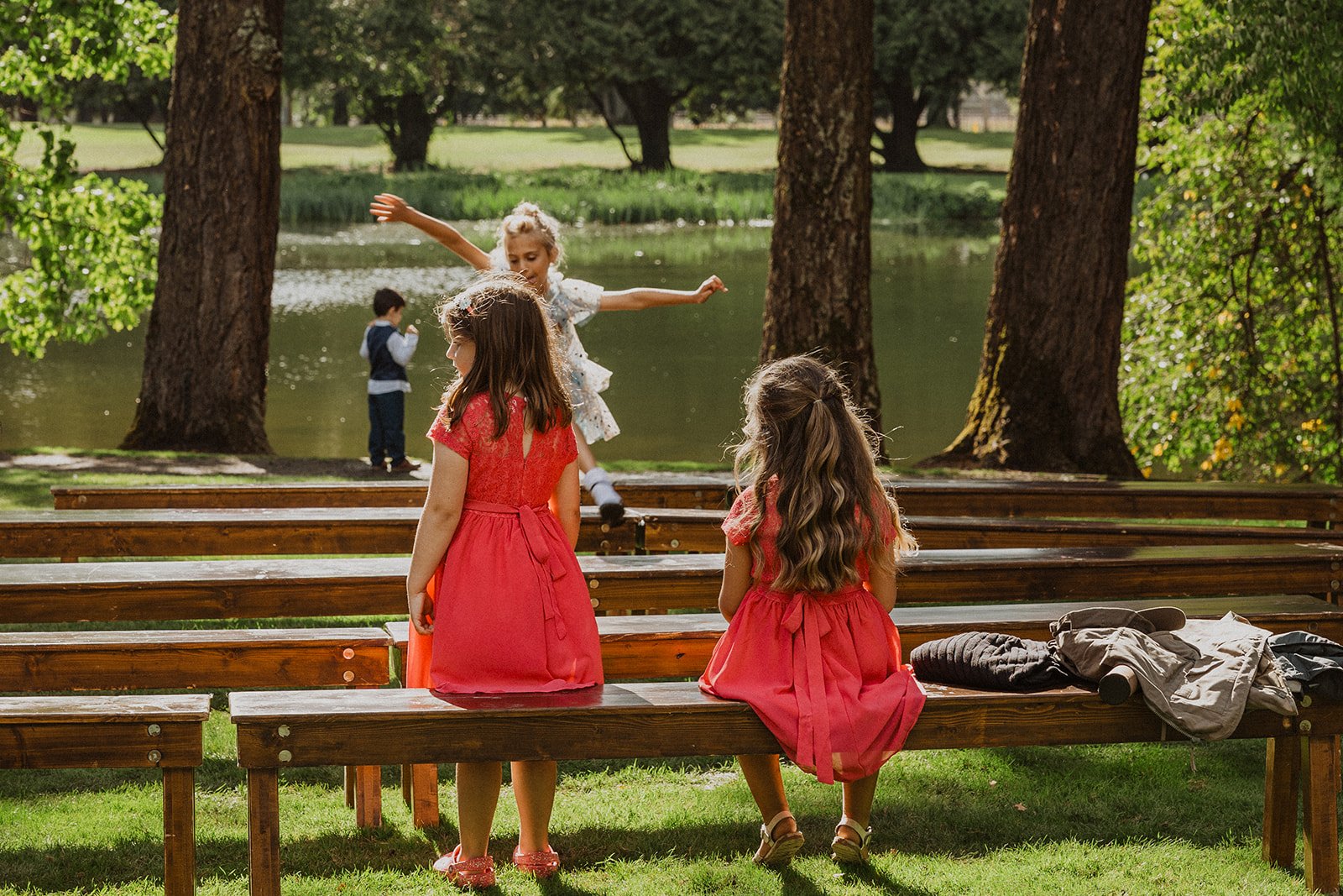Children sit through an early afternoon ceremony still wide awake and watching
