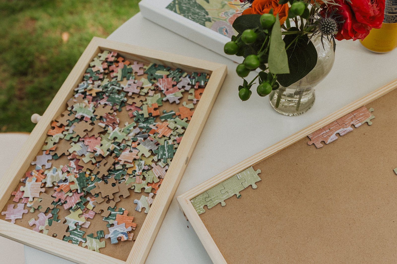 Wooden trays of puzzle pieces instead of a guest book at Crystal Springs