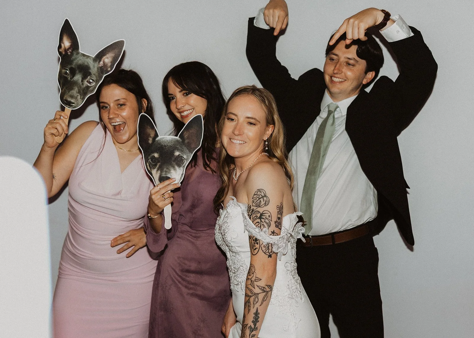 Packed photobooth late in the evening at a Portland wedding reception