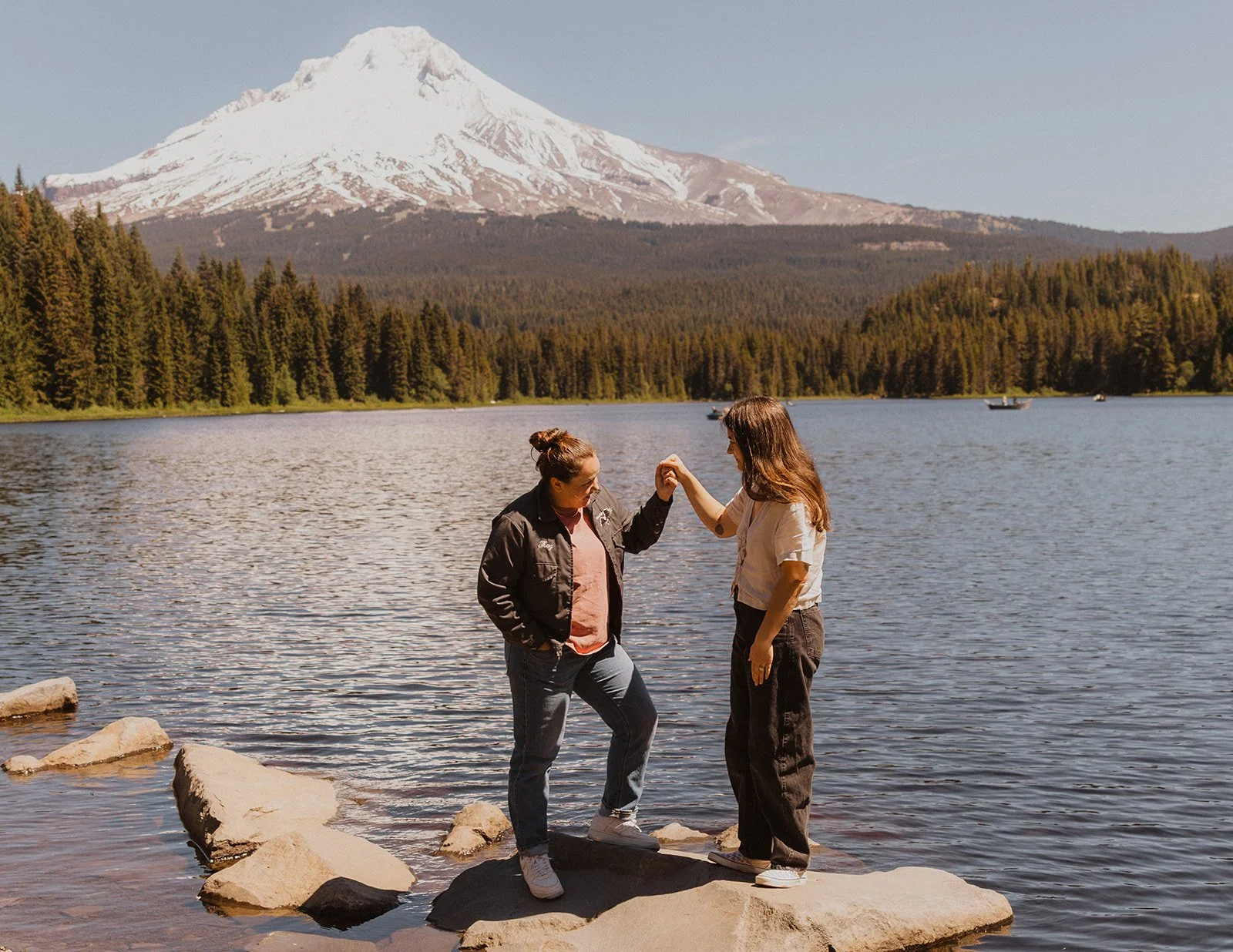 Something like a slow dance turn out on the rock by the water