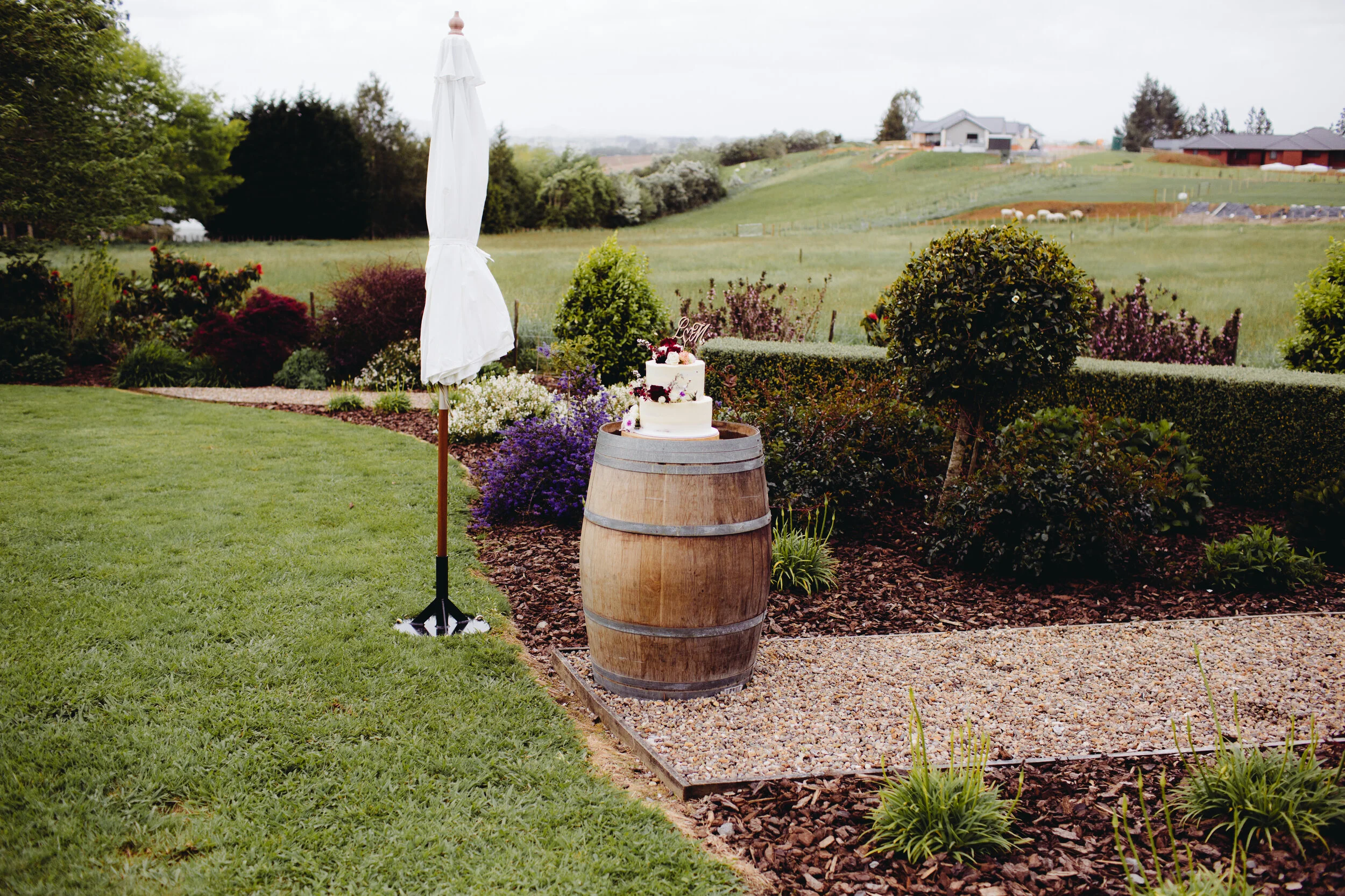 Love Club’s wine barrel &amp; umbrella with stand