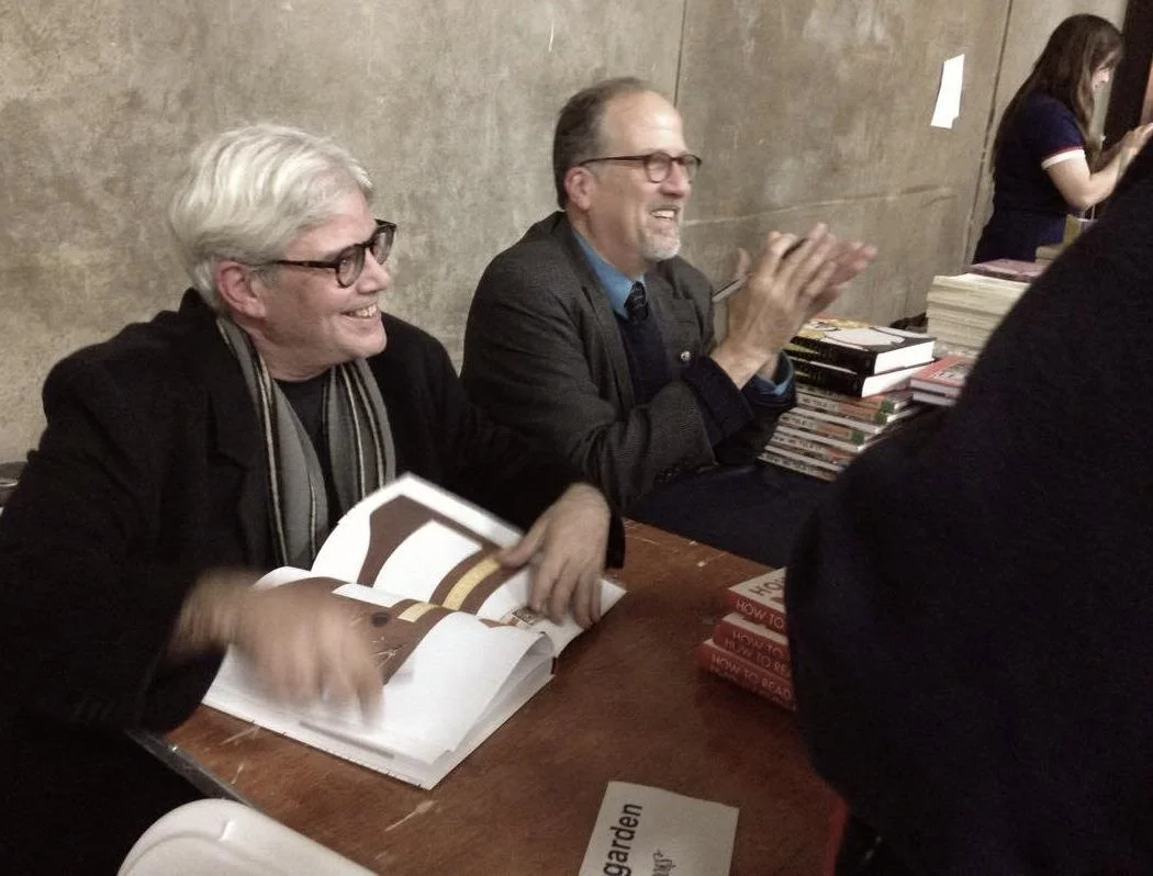 Newgarden (left) and Karasik sign books at the 2017 Comic Arts Brooklyn festival. Photo by and © Beth Pearson