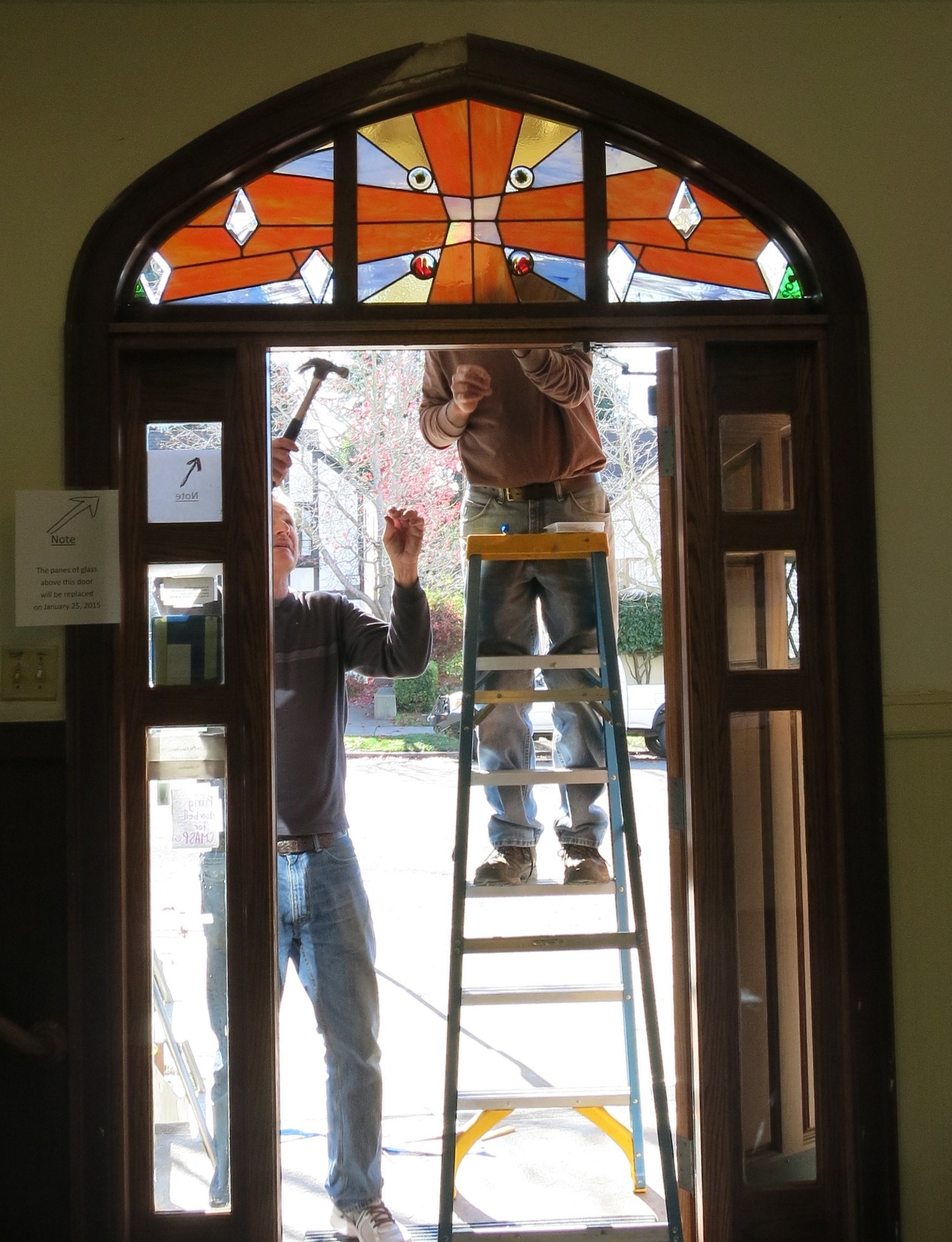 Skilled church volunteers install the panels.