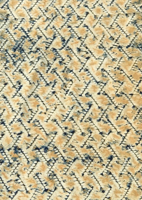 Erica Iseminger eeisemi@gmail.com Rust/indigo shibori fabric 76" x 18" NFS This piece was stitched in ori nui. The threads were tightened, then put into a ferrous sulfate bath. It was then wrapped on a pole, areas blocked out and overdyed in indigo.