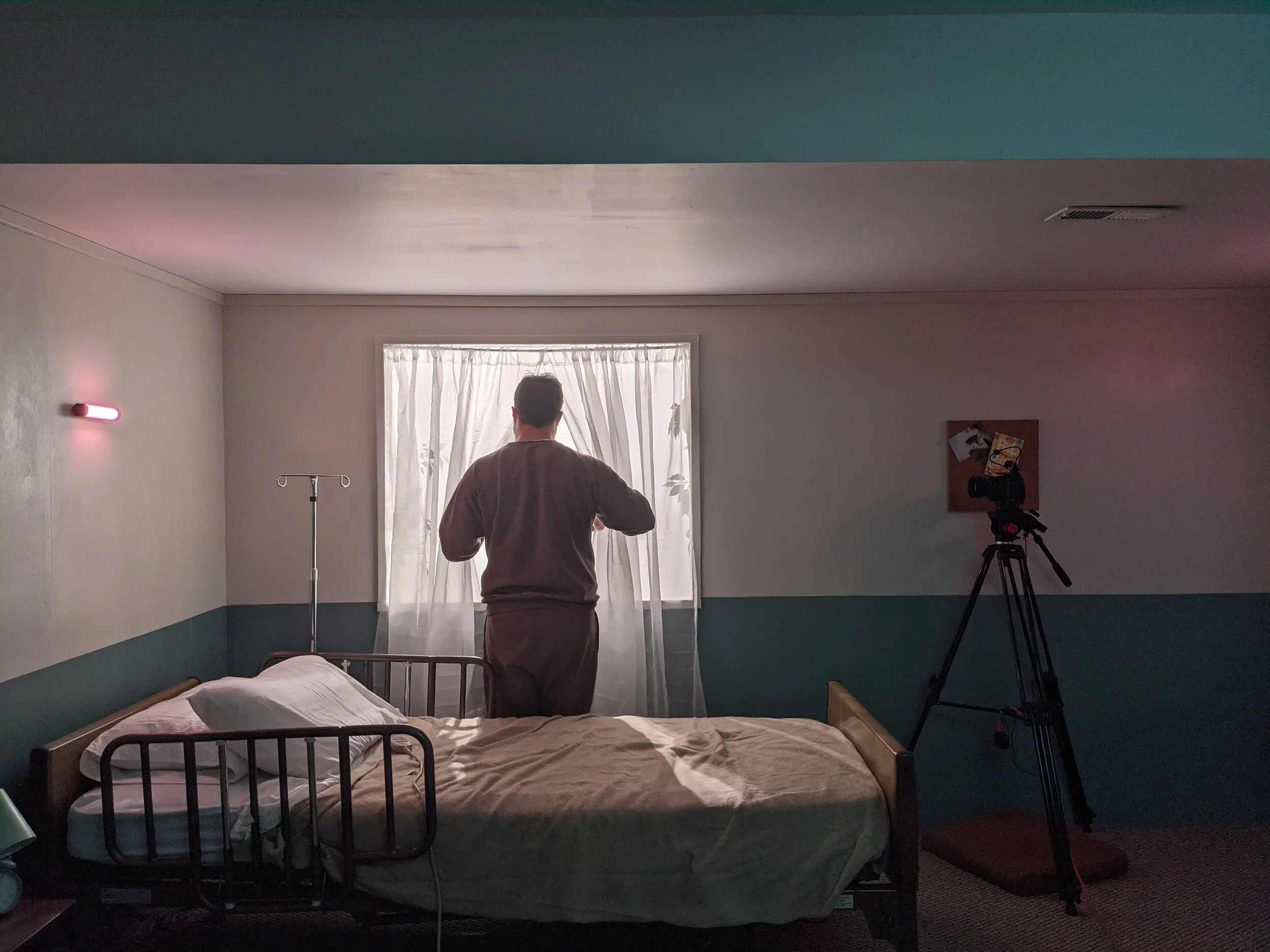  Filming The Patient peeking out the window 