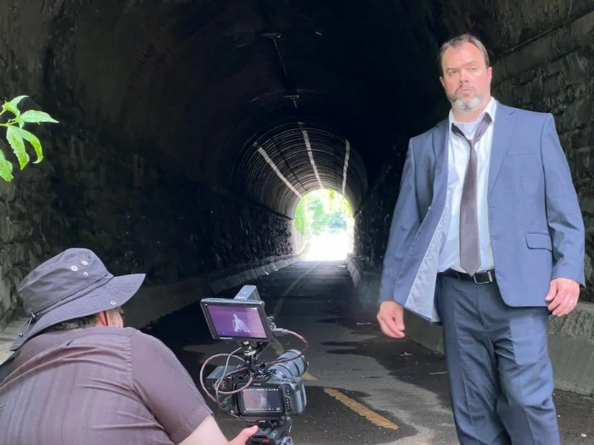  Hunter directing Mark in the tunnel 