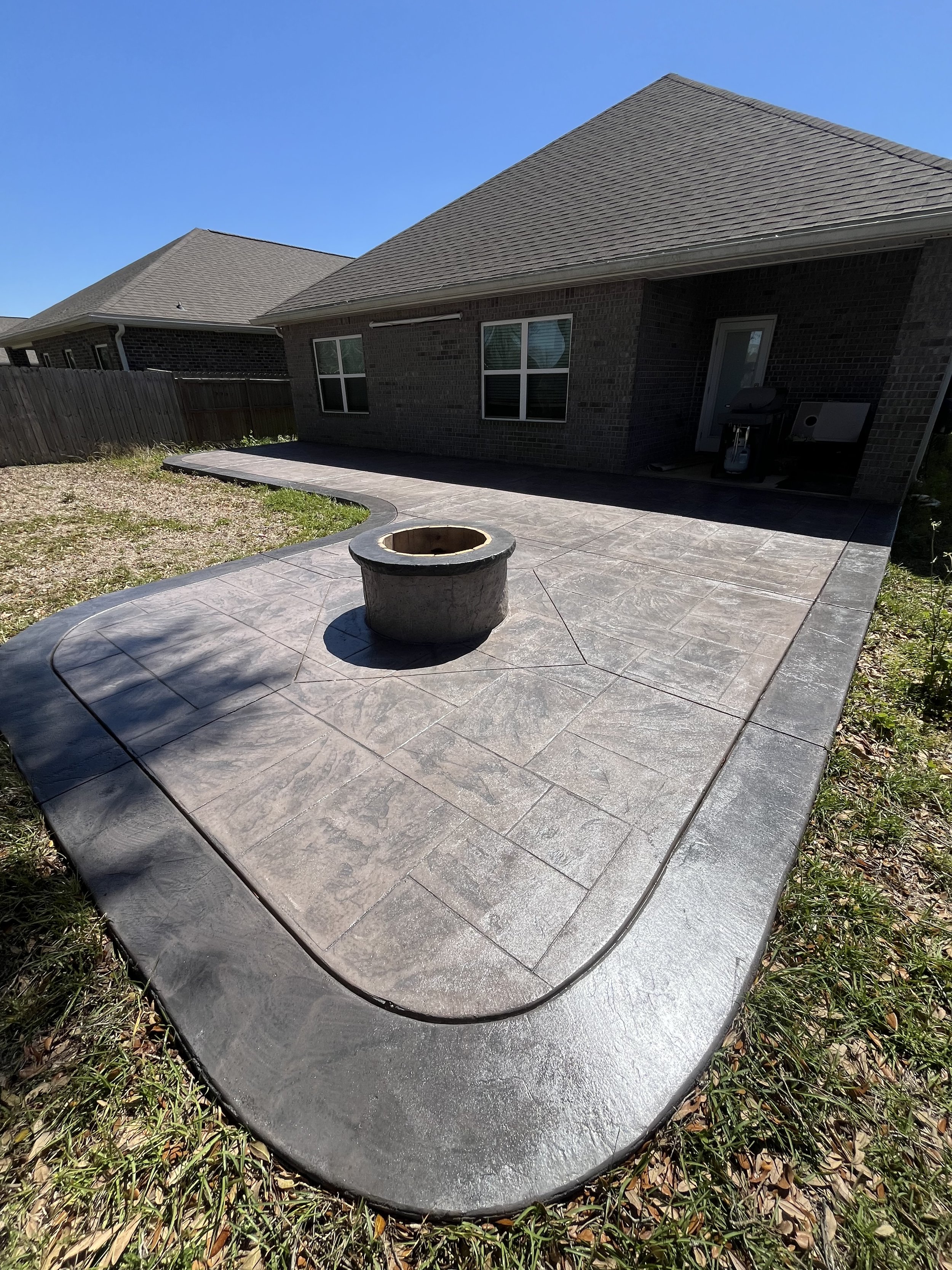 Large Outdoor Patio with Stamped Concrete Ashlar Pattern - Pensacola, Florida