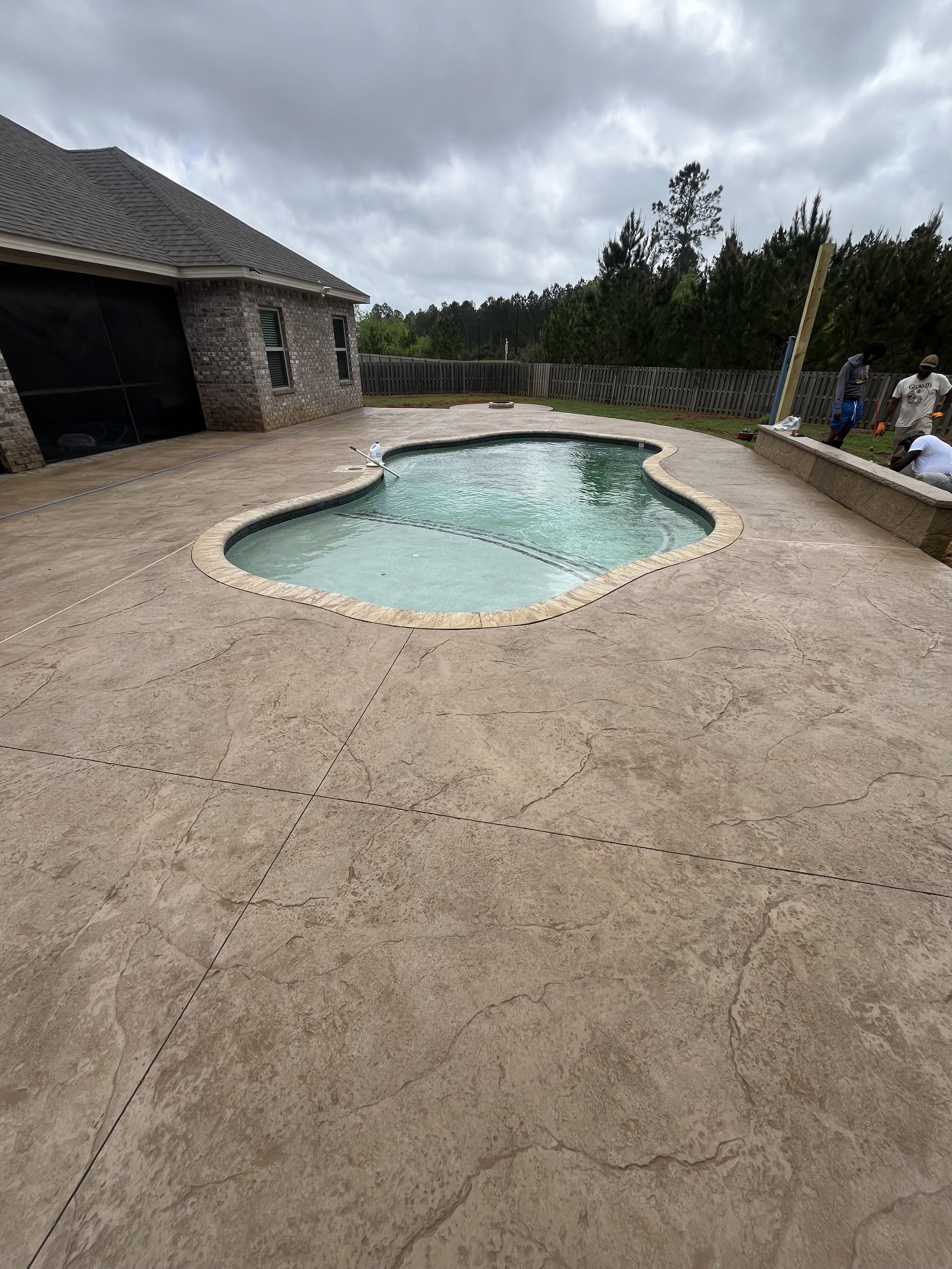 Custom Pool Deck with Seating Bench with Stamped Concrete - Spanish Fort, Alabama
