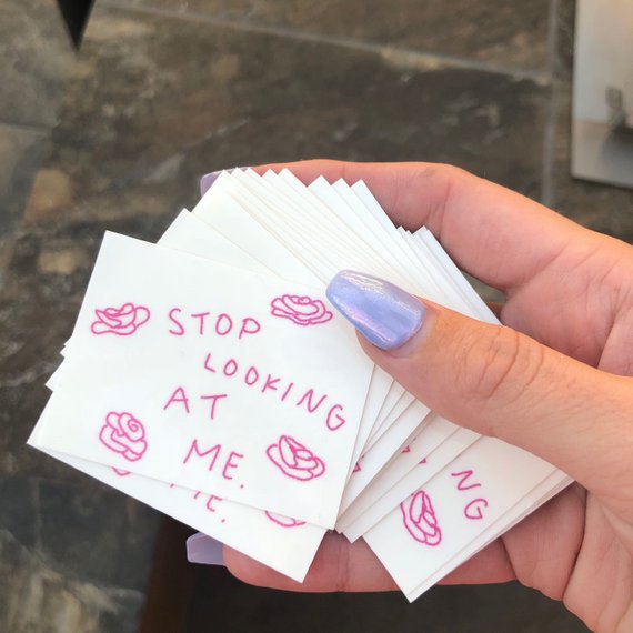 1 “stop looking at me” temporary tattoo - cut around them as small as possible :)