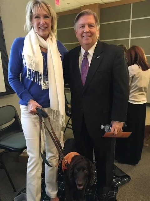 Roxy Reading Therapy Dog President Diane Smith and Jim Brezler CEO Doylestown Health.