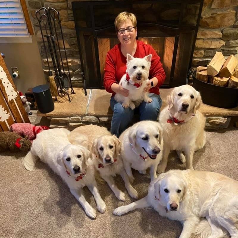 Phyllis at home with her pups.