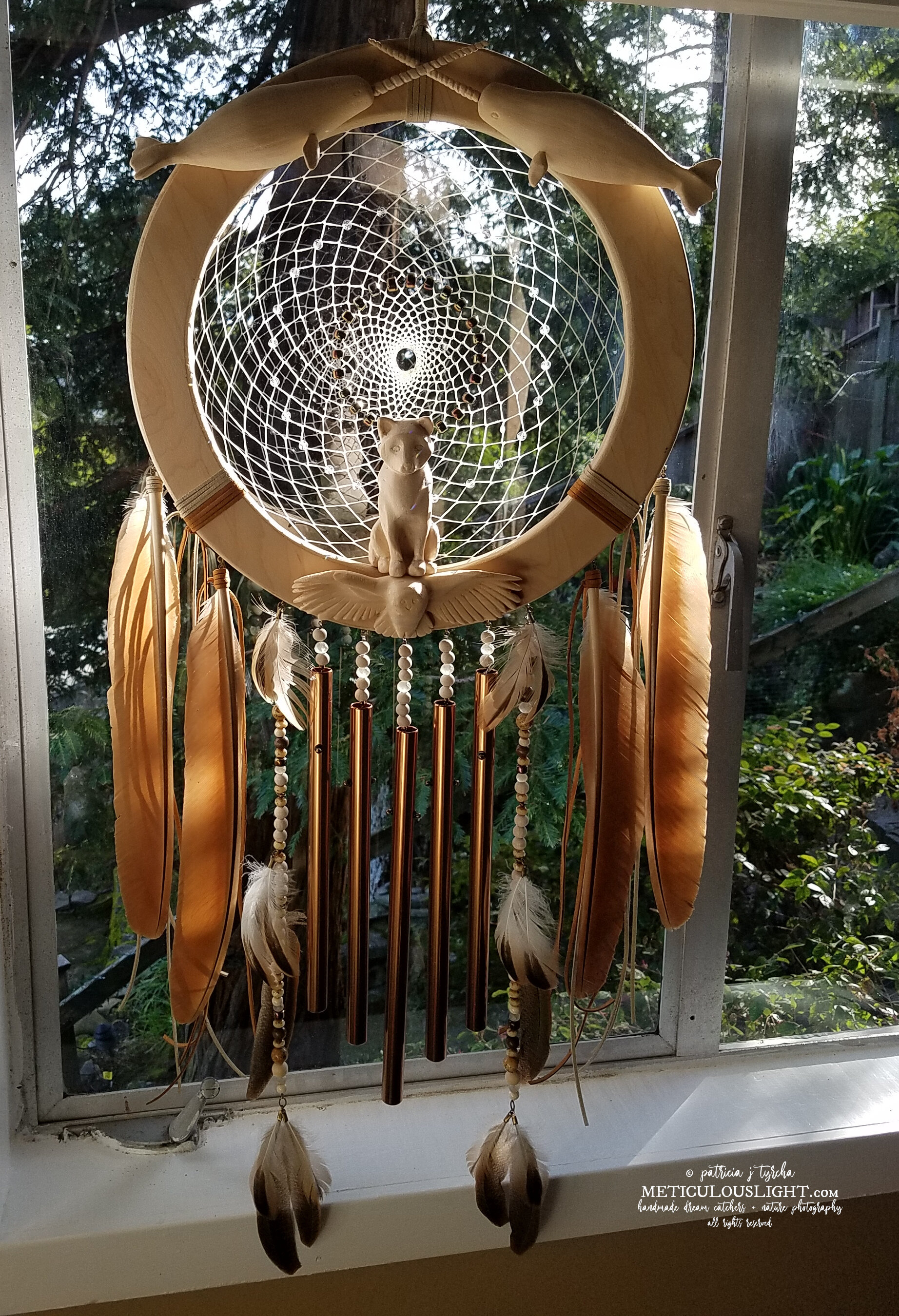 © patricia j tyrcha Custom Dream Catcher with carved spirit animals, windChimes, and cruelty free feathers W ALL RIGHTS RESERVED.jpg