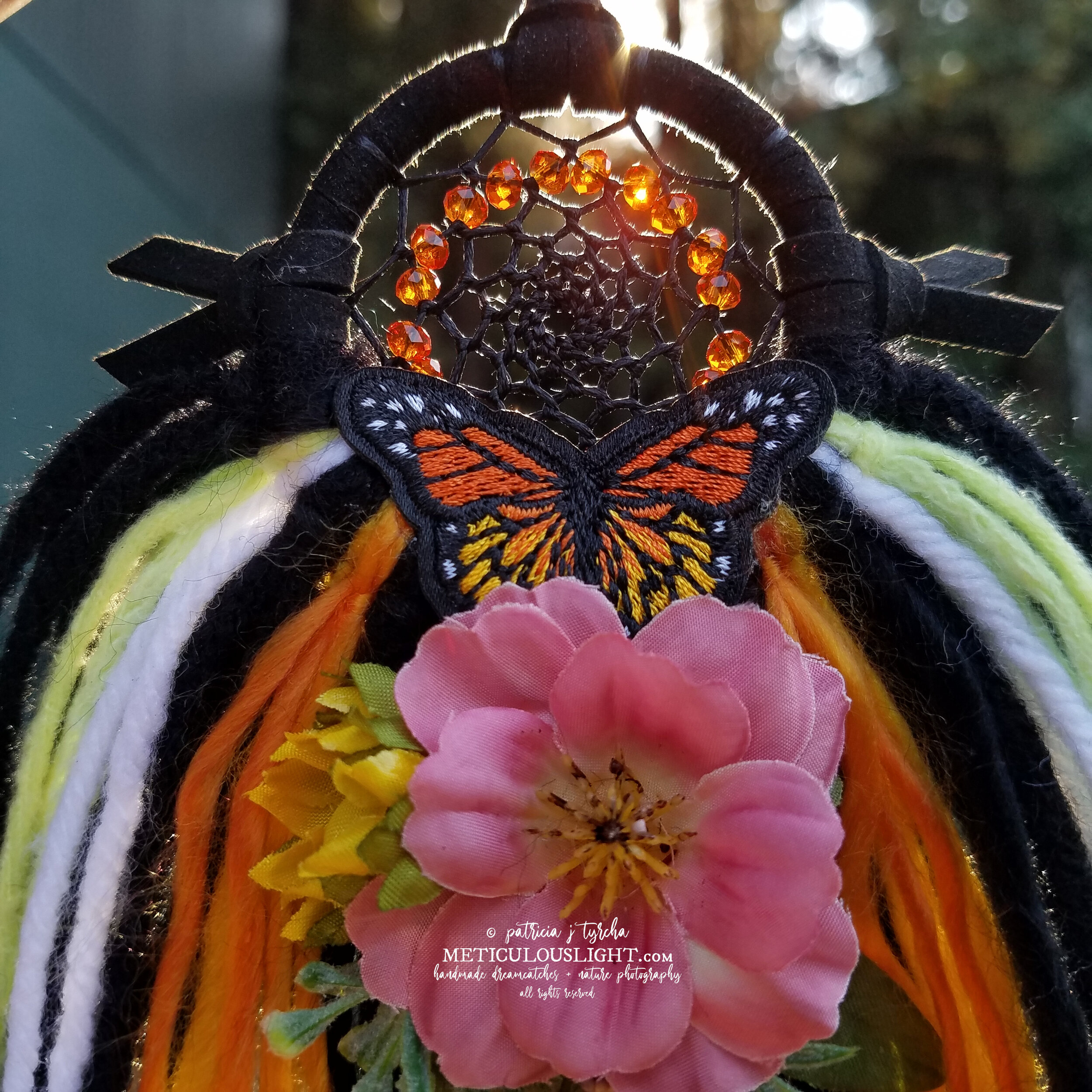 © patricia j tyrcha Monarch Butterfly Dream Catcher with flowers and milkweed seeds ALL RIGHTS RESERVED METICULOUSLIGHT1W.jpg