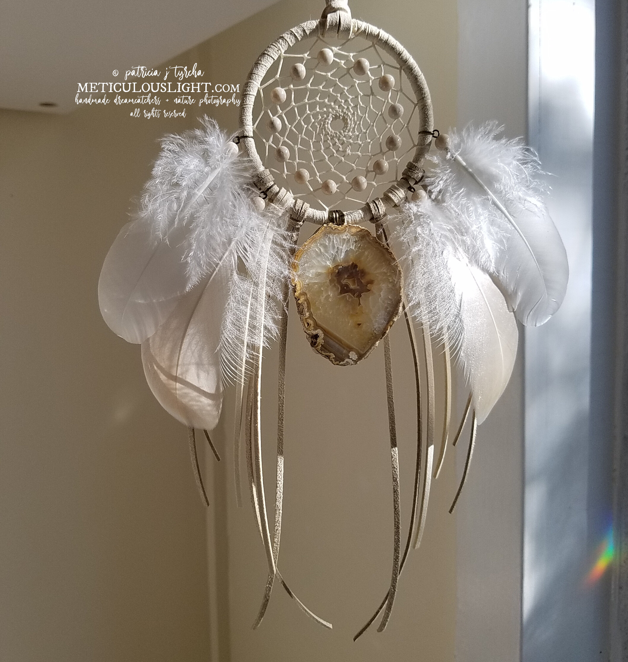 © patricia j tyrcha Natrural Geode Slice Dream Catcher, cream, tan, cruelty free feathers, traditional, natural stone beads ALL RIGHTS REERVED2 - Copy.jpg