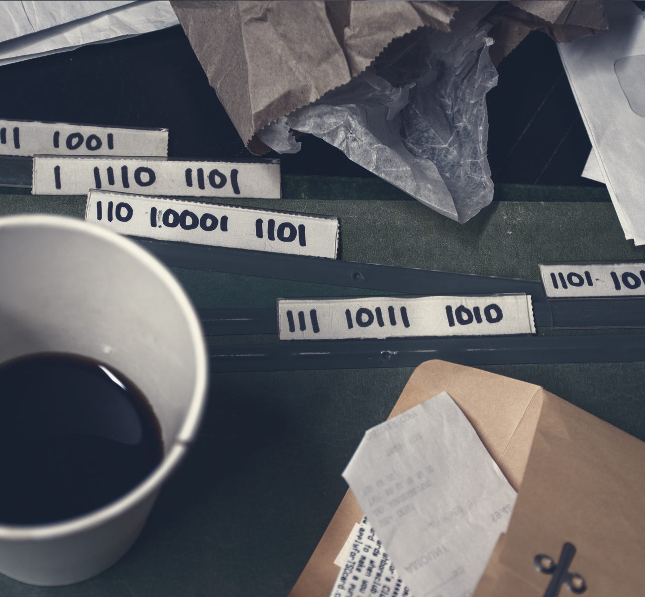 The file folder tabs read: “1101 10101 1100” “111 10111 1010” “110 10001 1101” “1 11111 1001” “1 1110 1101”