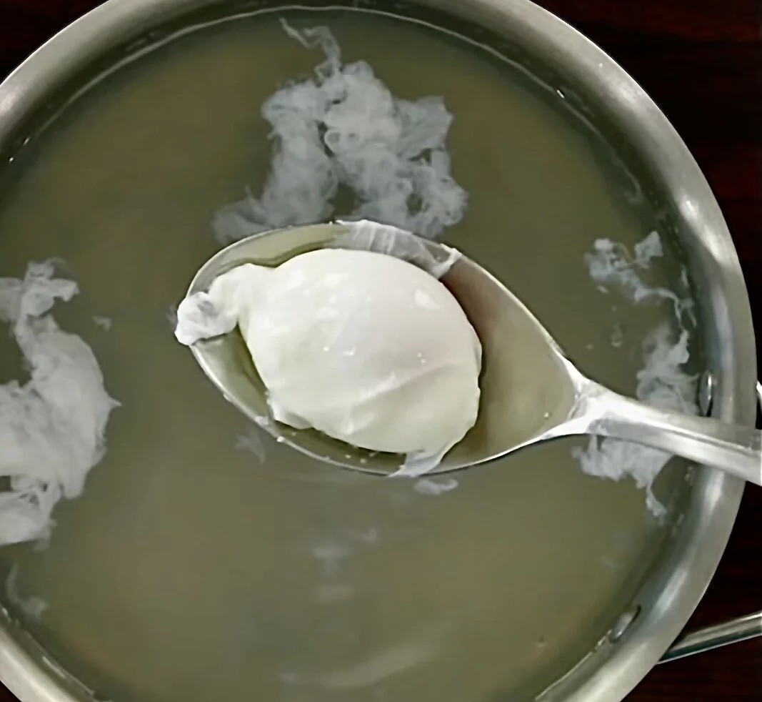 poacherd egg 4min after removed from heat with slotted spoon.jpg