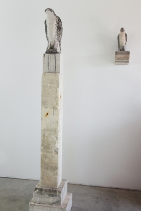  "Clock Tower," and "The Bird I Saw," Installation, 2009 Limestone and pigment 85 x 16 x 14 inches 
