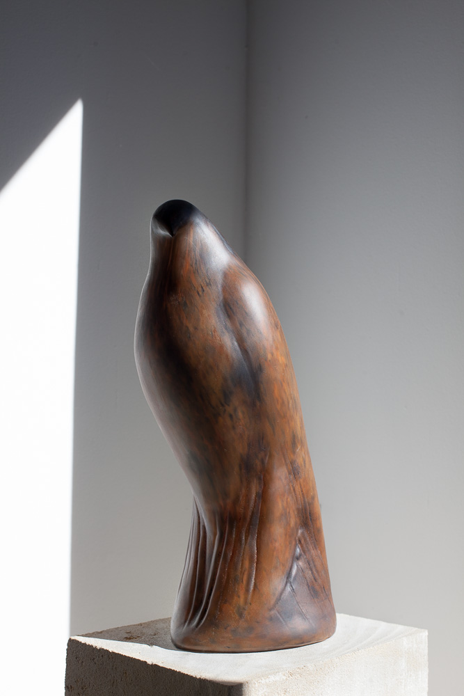  Cinnamon Bird, 2015  Hand blown pigmented glass on limestone   61 x 8 x 12 inches 