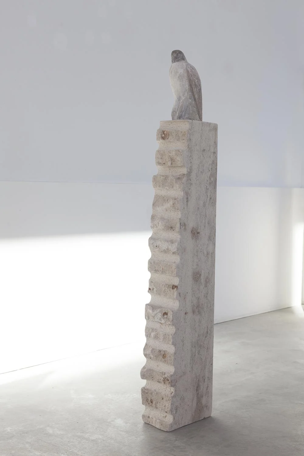  “White Bird on Ladder,” 2017  Fossil limestone 56 x 10 x 6 inches 