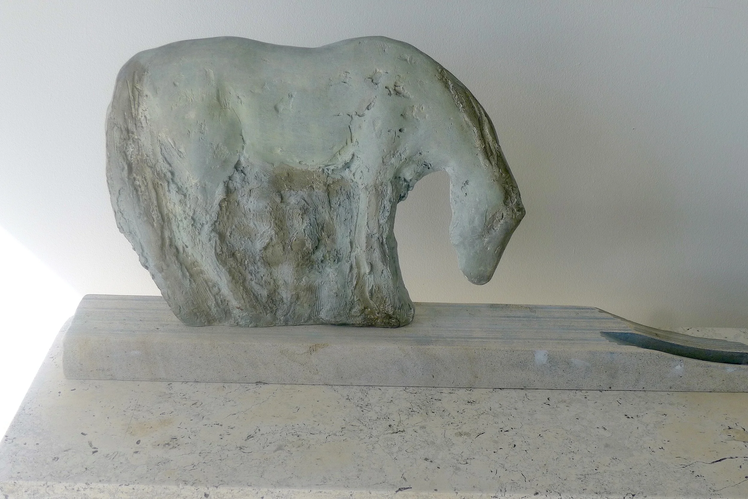  Blue Cash Cut Out, 2016  Unique patina bronze and limestone  15 x 31 1/2 x 4 1/2 inches 