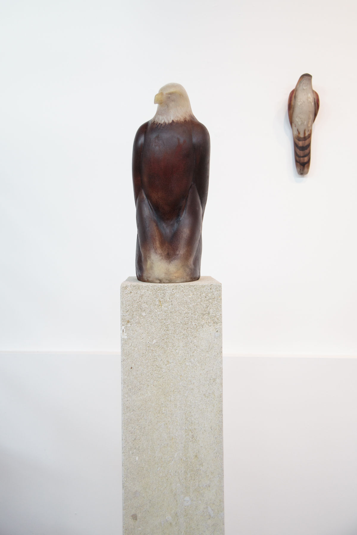  “Eagle,” 2019 Handblown pigmented glass on limestone  62.5 x 8 x 11 inches  