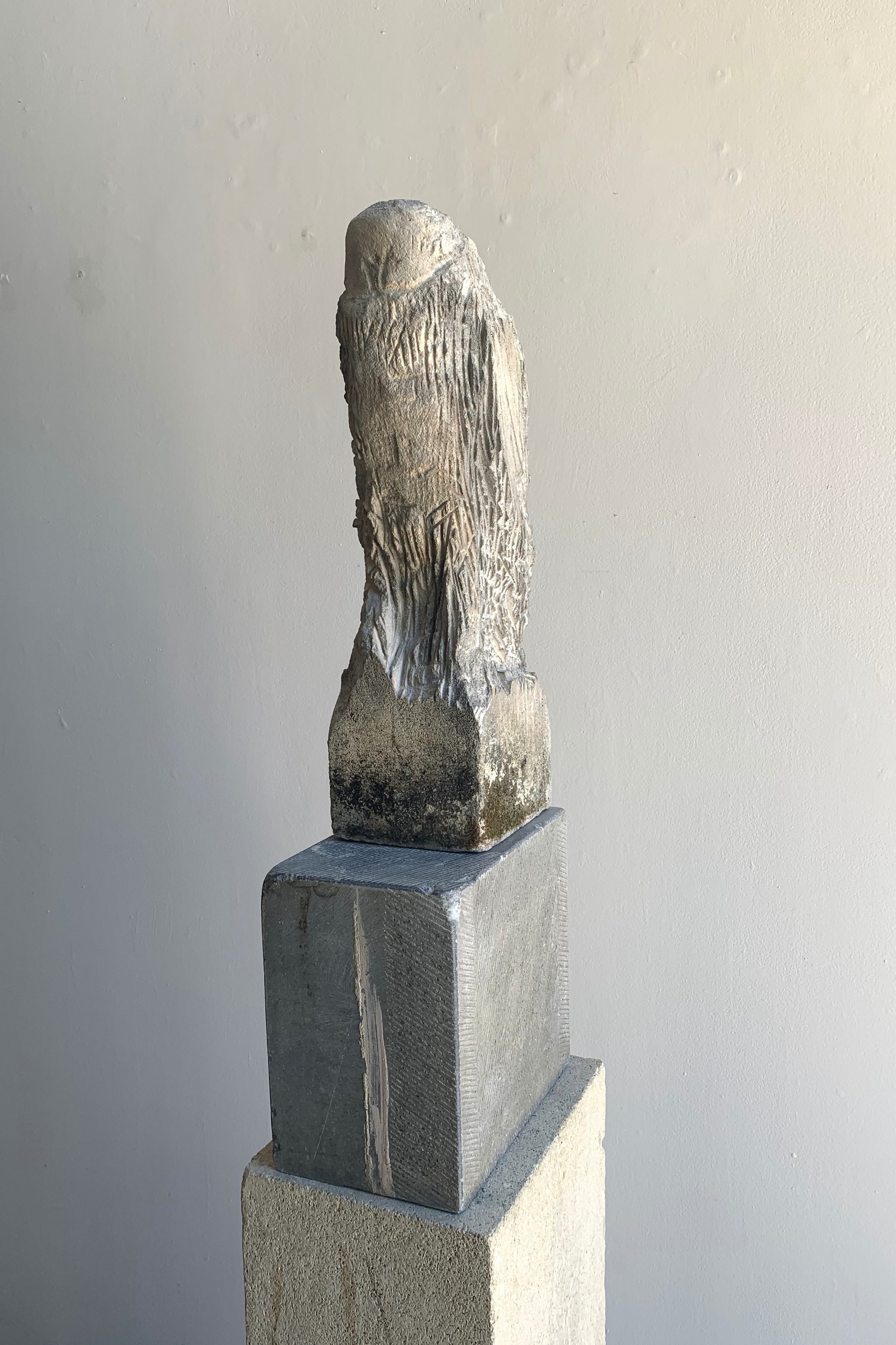  “Night Owl,” 2019  Limestone and pigment  63 x 8 x 10 inches 