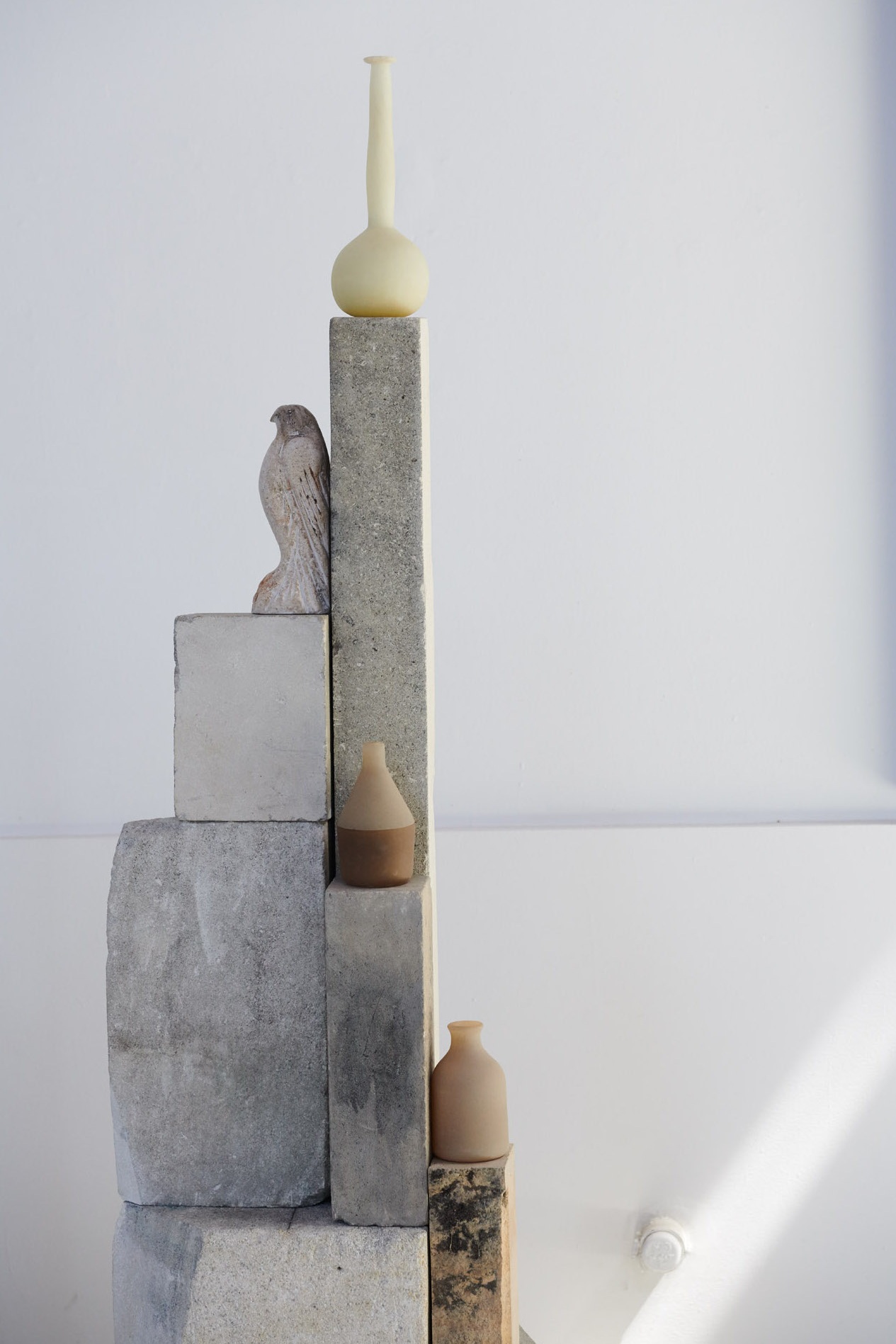  “Morandi Tale,” (detail) 2019  Limestone, cast glass and blown glass elements 75 x 105 x 32 inches 