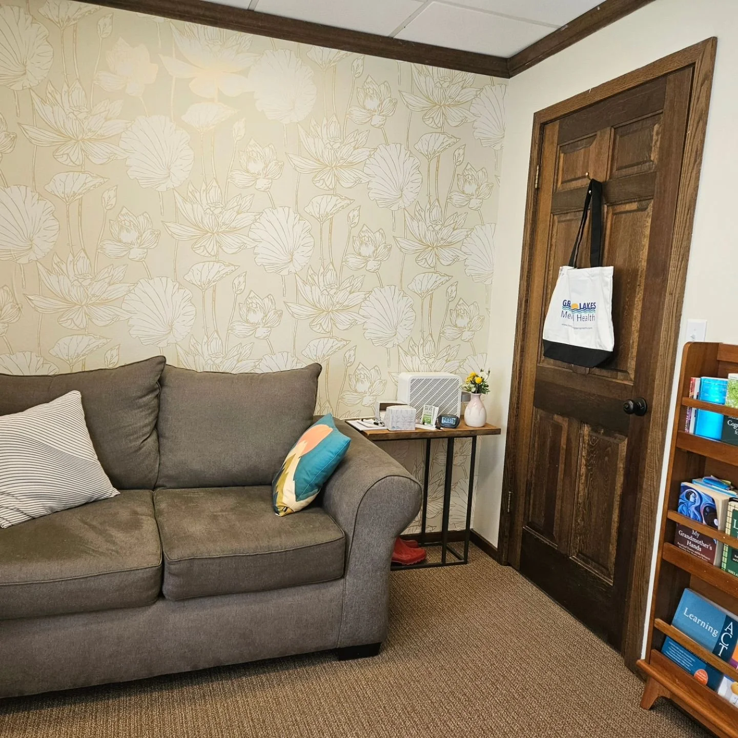 Each of our offices is furnished with sofas or chair-and-a-half seats, and all furniture is rated to a minimum of five hundred pounds. This is Amanda Taylor's office. It is our coziest, cutest space. Isn't that wallpaper great?

#allbodiesaregoodbodi