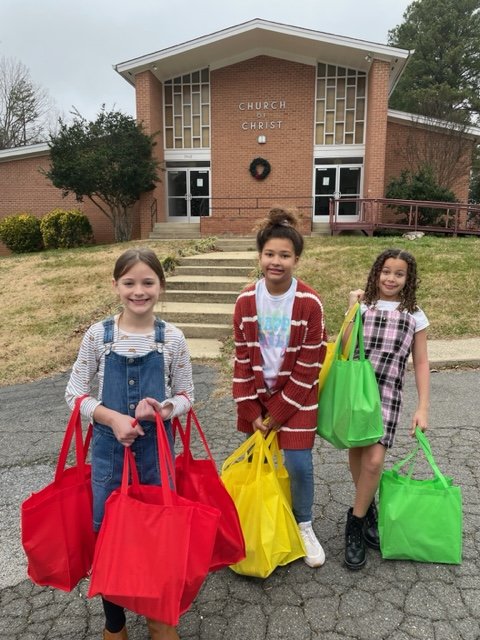 Some of our kids delivering donations!