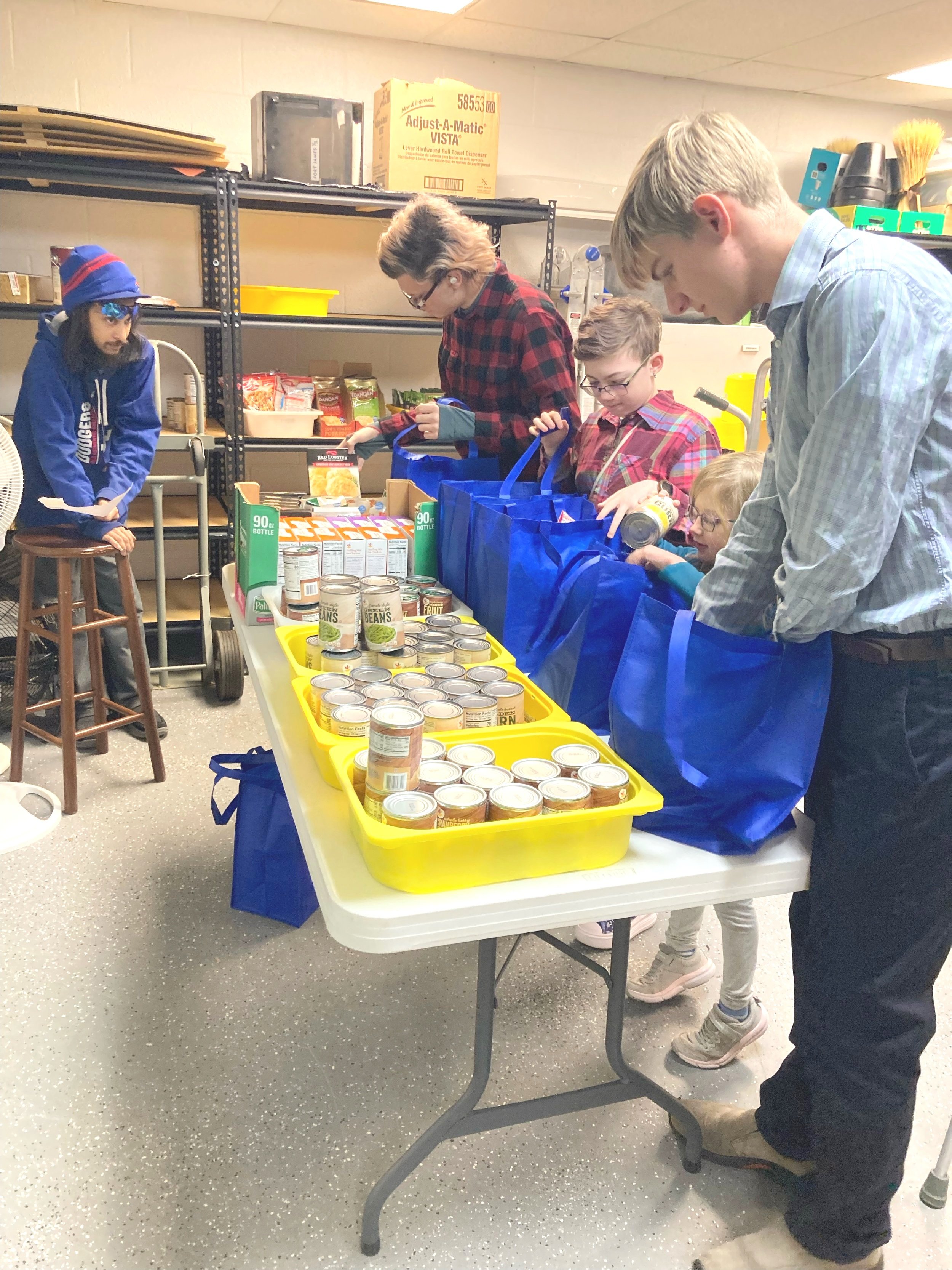  Some of our teen group creating holiday food baskets. 