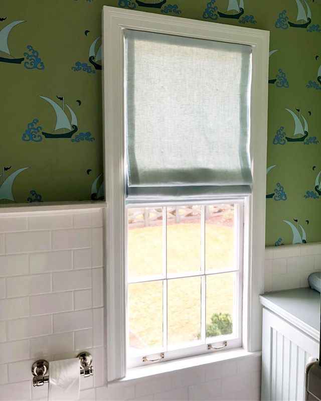 This sailboat wallpaper has me dreaming of summer while we brace for the snow! Love how this sweet boy&rsquo;s bath turned out! 💚 ⛵️ #caitiemorganinteriors