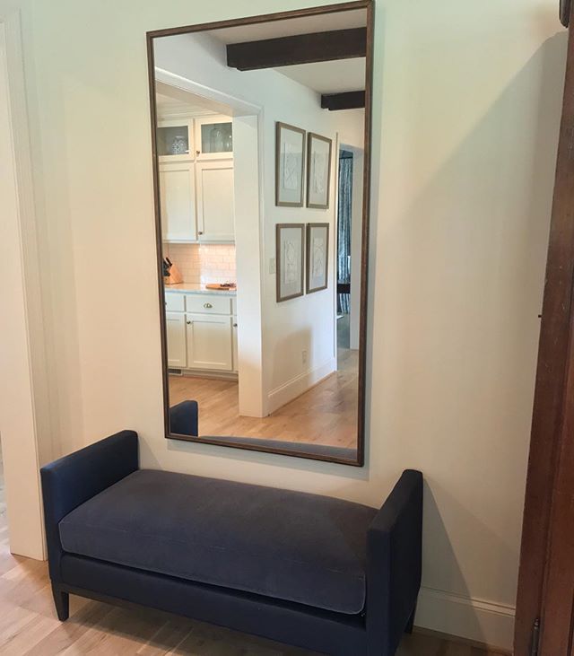 One of my favorite dens 🖤 navy velvet bench with mohair seat, antiqued brass mirror, and some beautiful mixed-media pieces by @janetimberlakecooper via @maison_shoppe #caitie#caitiemorganinteriors #cmi #poedrive