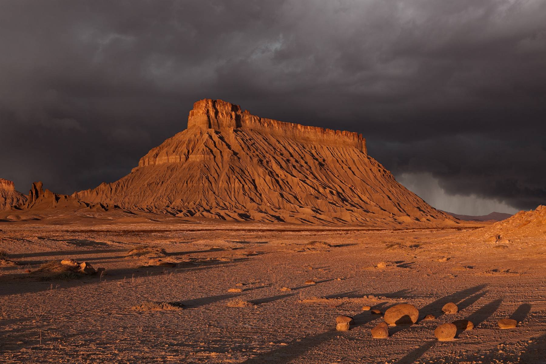 A dramatic stormy image of Factory Butte, where I have not yet been