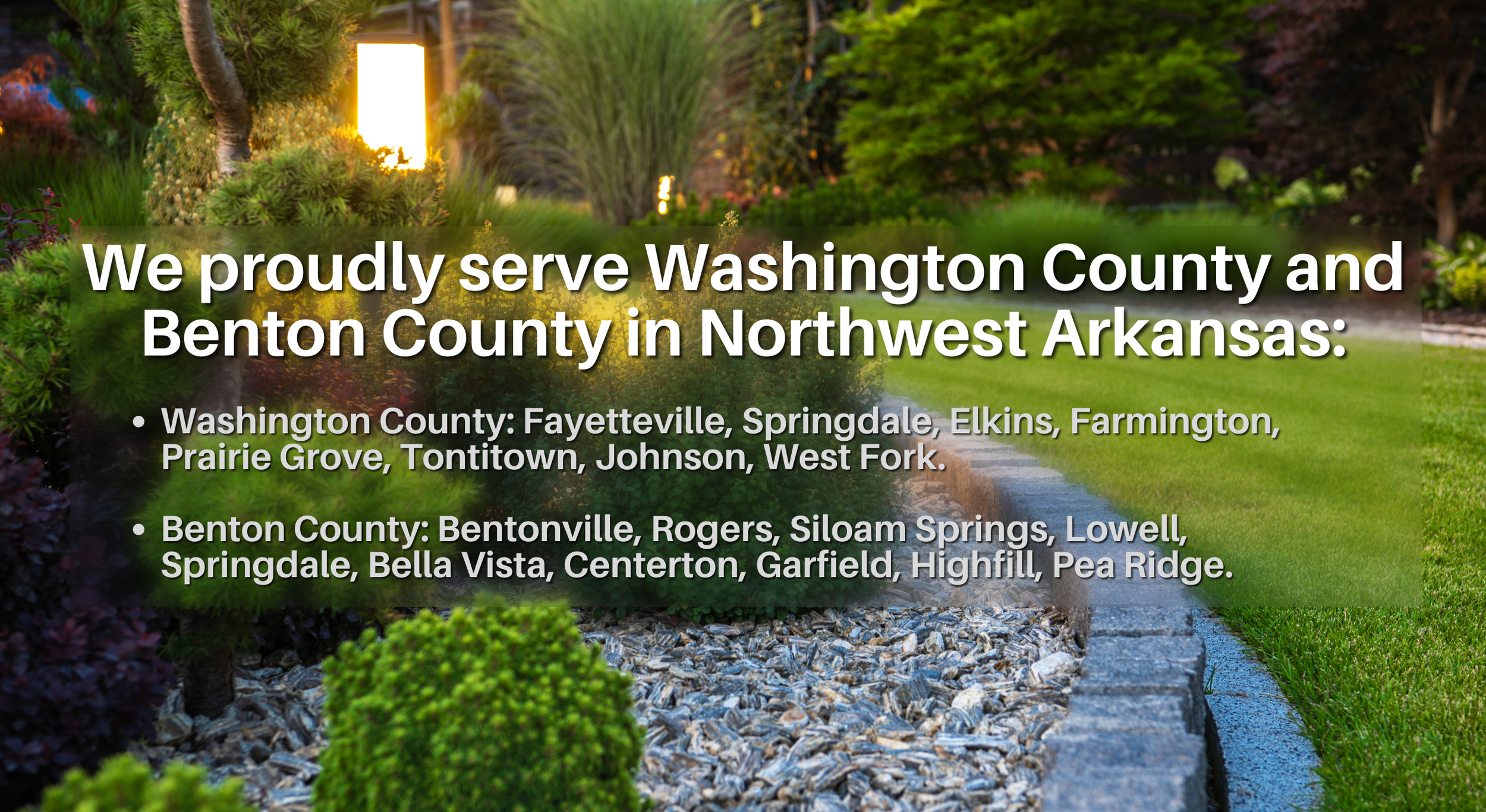 Landscaped yard with stone edging and pathway representing ABI Systems service areas across Washington County and Benton County in Northwest Arkansas