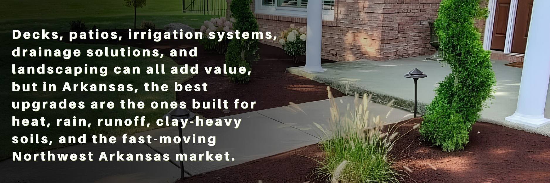 Arkansas home front entry with landscaping, walkway, mulch beds, and path lighting illustrating high-ROI outdoor upgrades.