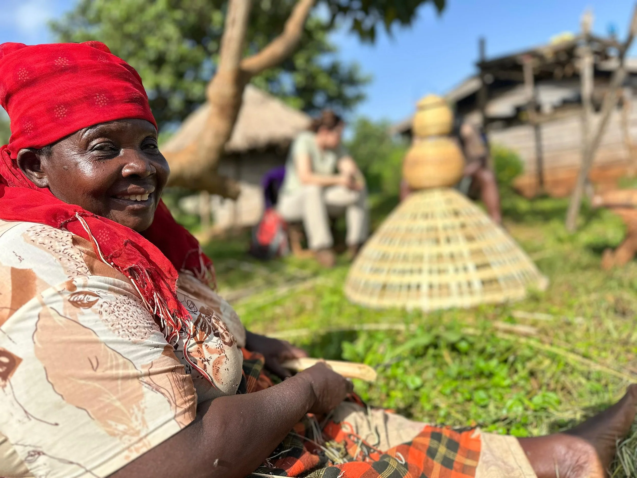 Community woman in Mengia village weaving a bamboo basket