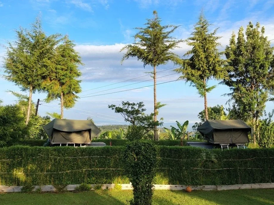 Rooftop tents at the green campsite of Home of Friends in Kapchorwa near Sipi Falls, Mount Elgon.