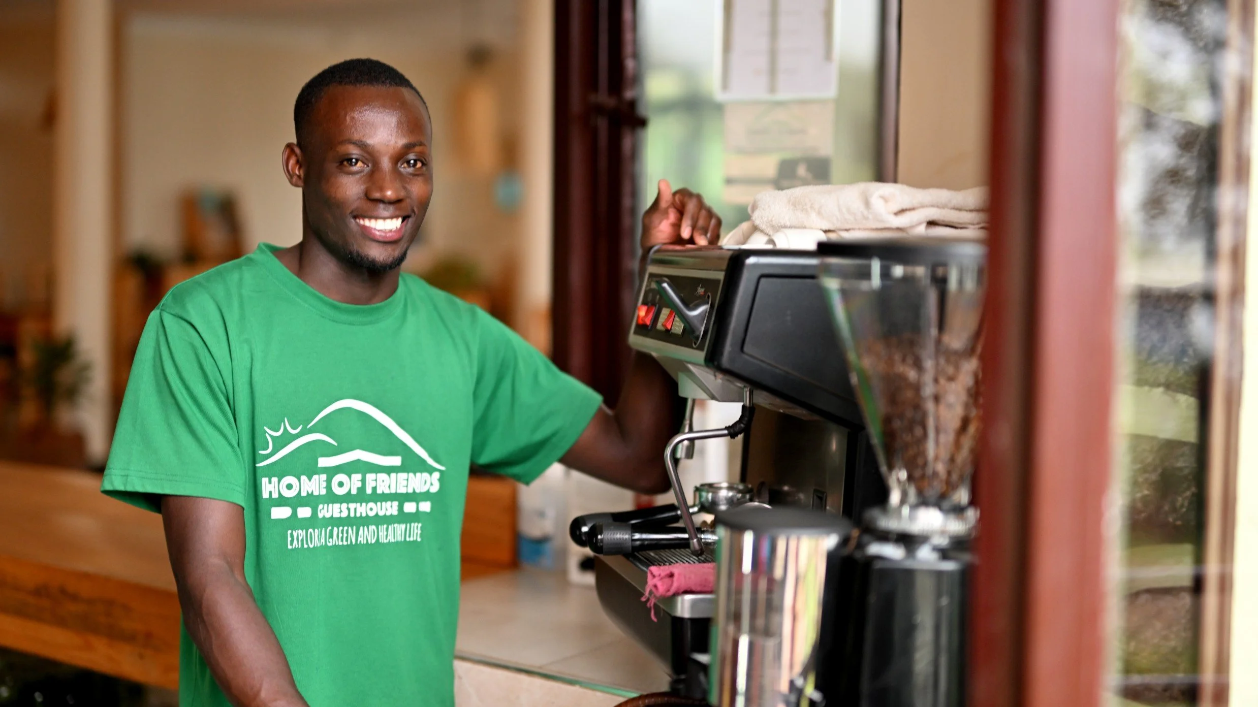 Barista Derick at coffee machine