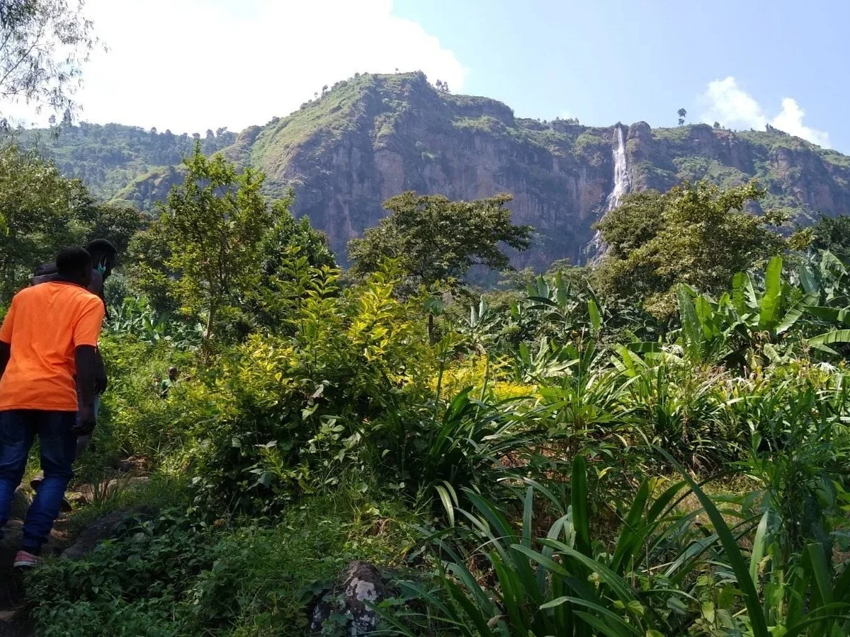 A Home of Friends staff member preparing to climb Wanale Ridge.