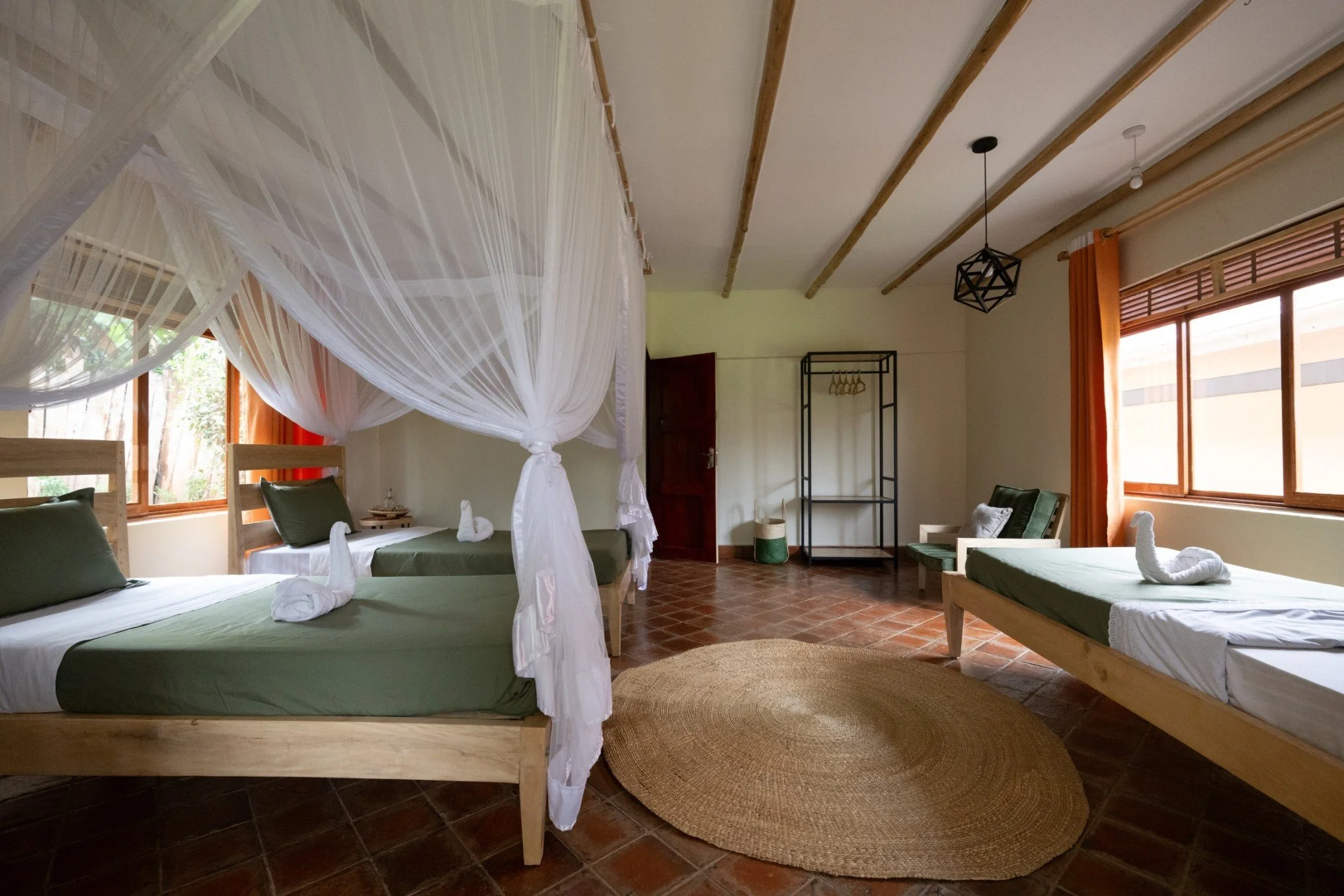 Spacious triple room at Home of Friends Guesthouse in Kapchorwa, near Sipi Falls.