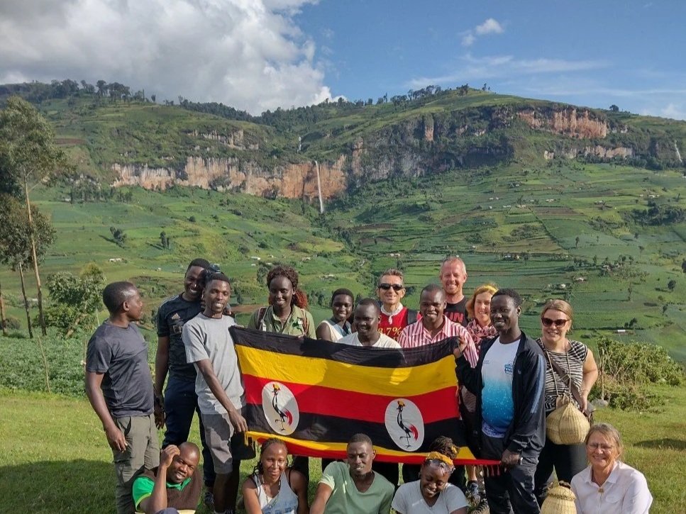 Uganda-based tour operators on a familiarisation trip at Mengia waterfall in Kween District