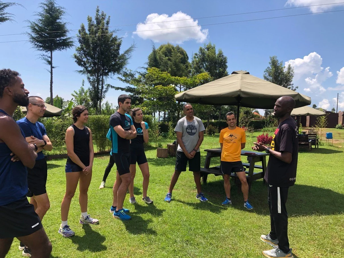 A group of Brasilian runners being briefed by our running guide David Cherop (older brother to Stephen Kiprotich)