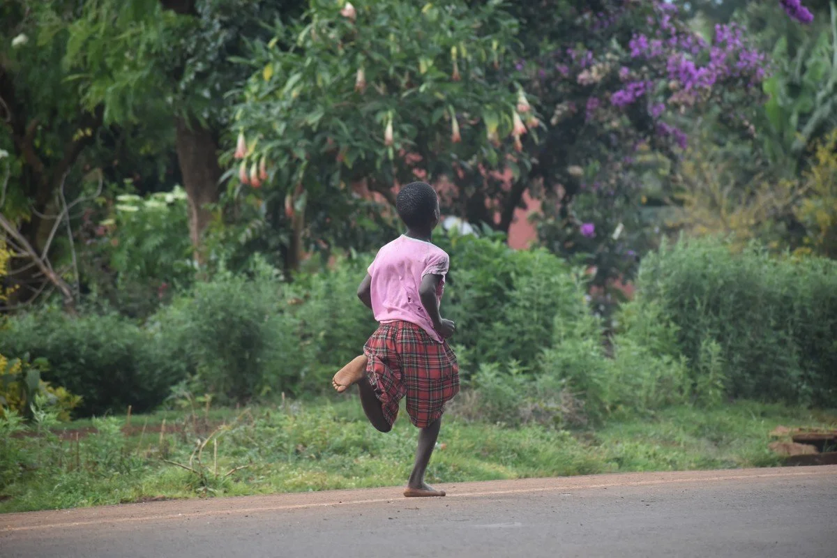 A junior running talent during a Kapchorwa Community kids run in 2022