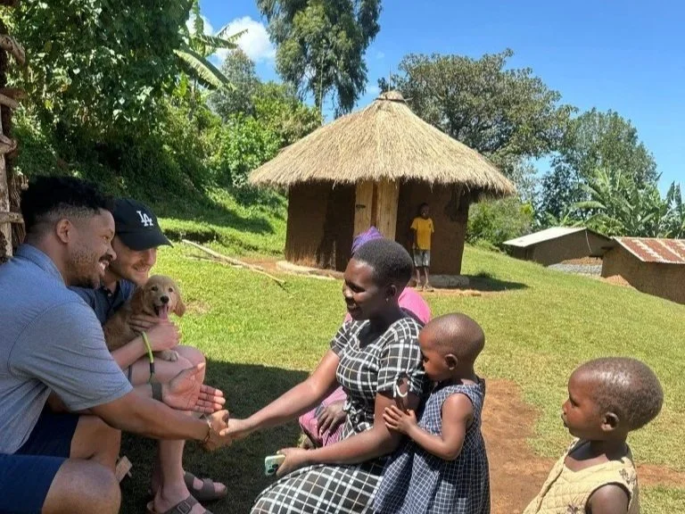 Guest meeting one of the Kapchorwa Mamas during their cooking experiences in the slopes of Mount Elgon in Kapchorwa.