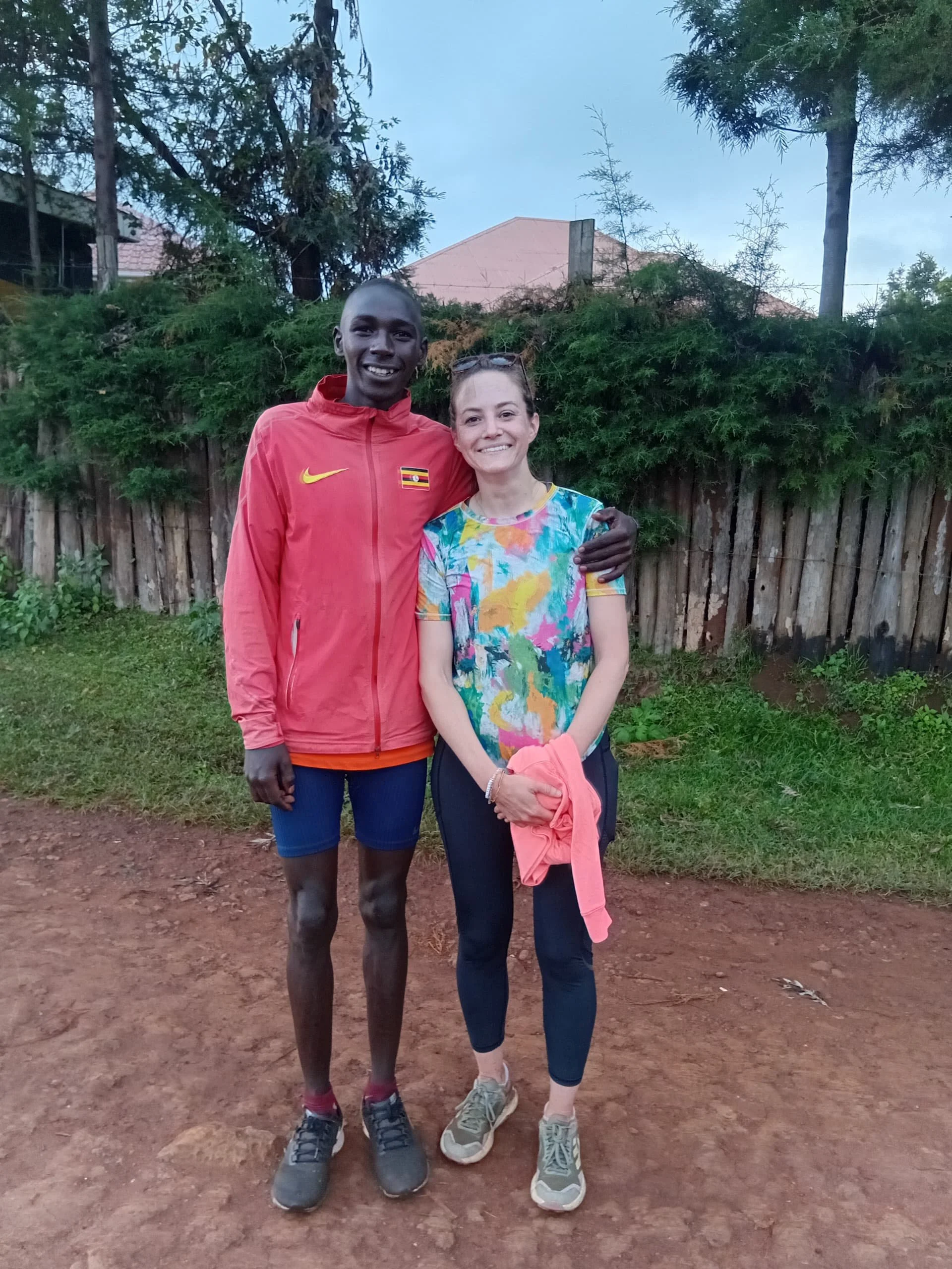 Running guide Elijah with a happy client after her Champion's Trail run