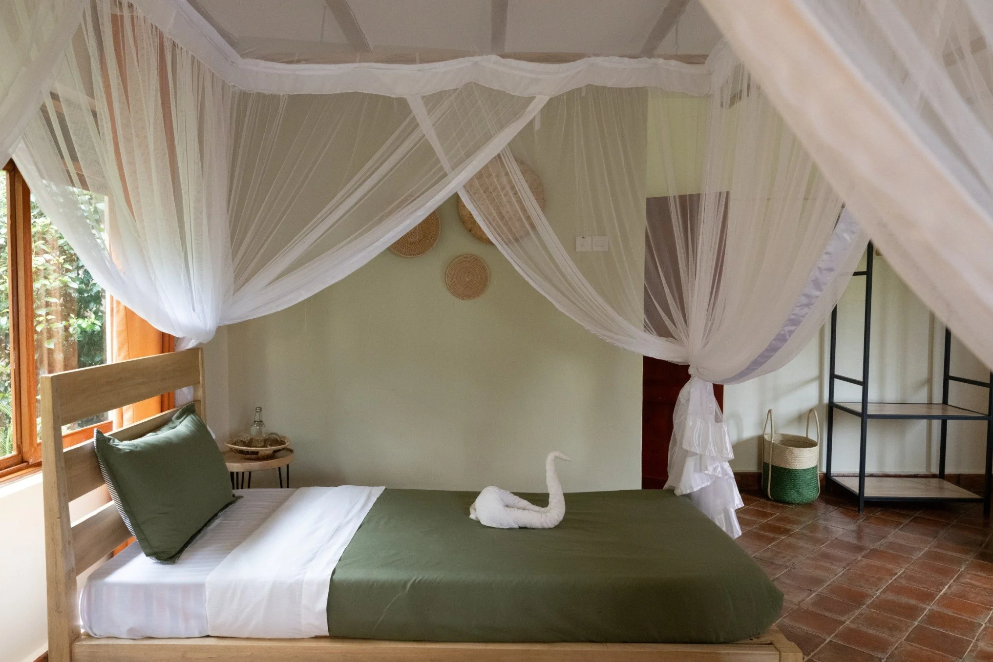 Natural interior of new flexible twin-triple room at Home of Friends Guesthouse in Kapchorwa, near Sipi Falls.