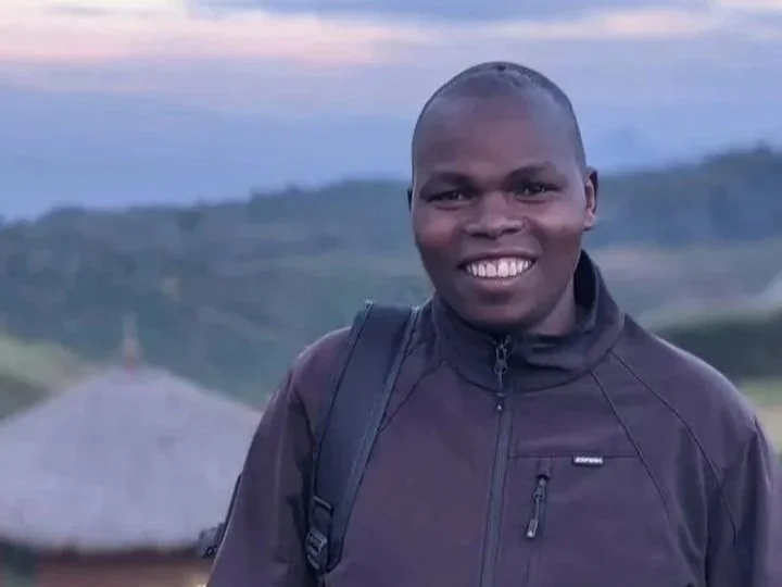 Mosopisiek Trail guide David Mande smiling in Yatui, Kween District