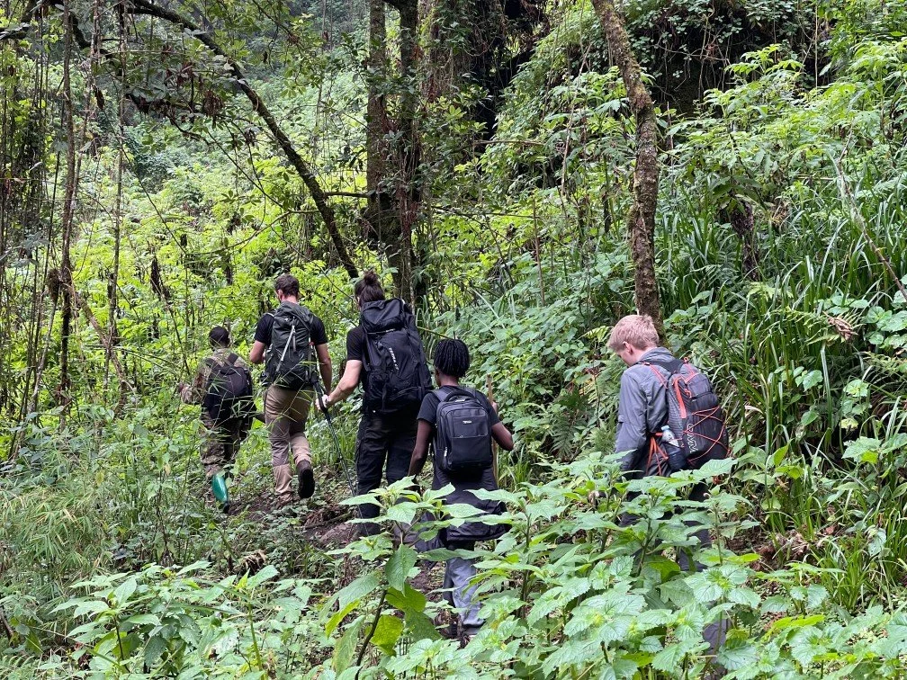 A group of hikers - including Home of Friends host Eliza - along the Bushiyi Trail
