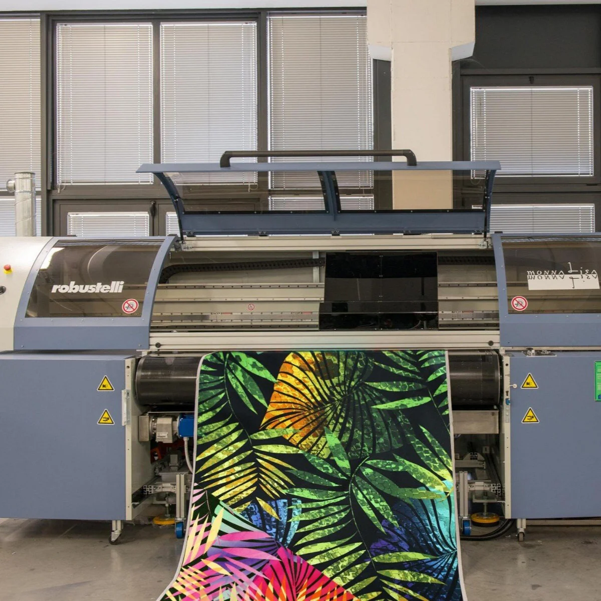 Epson Subsidiaries Robustelli And For.Tex To Merge