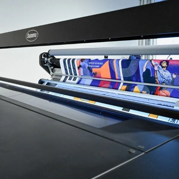 Summa Expands Laser Cutting Capabilities with Caron Cradle Feeder